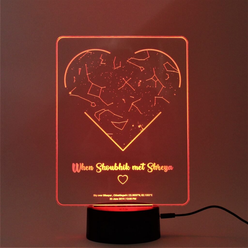 Personalized wooden LED lamp glowing on a bedside table