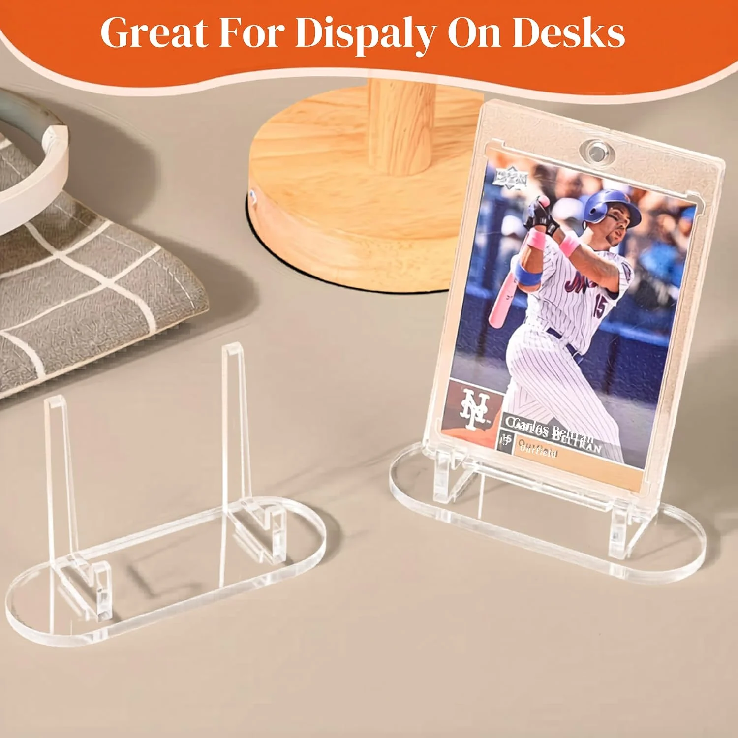 Acrylic display easel stand holding a card on a desk