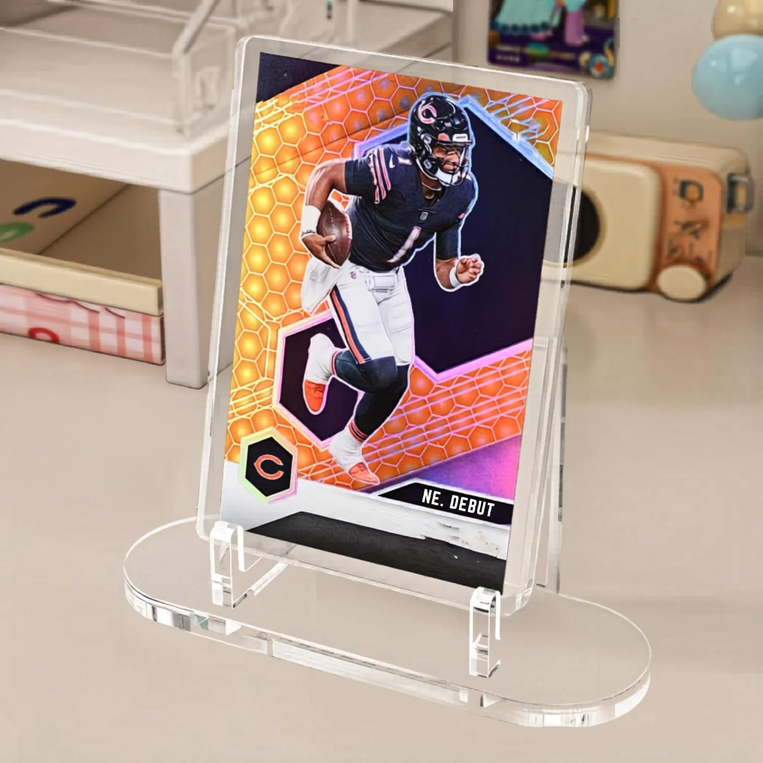 Acrylic display easel stand holding a trading card