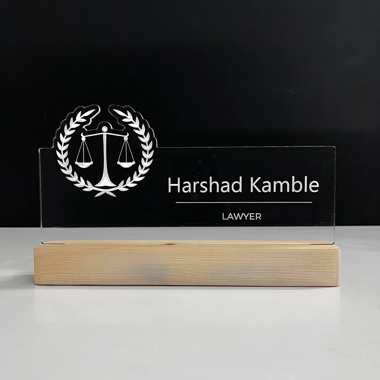 Personalised Name Lamp with Wooden Base for Lawyers – 10 x 6 inch – glowing on a desk