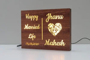 Couple name lamp with date – side view, glowing