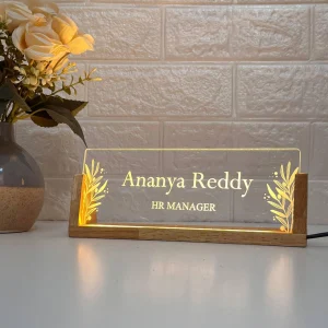 Floral leaf LED desk name plate – on a desk