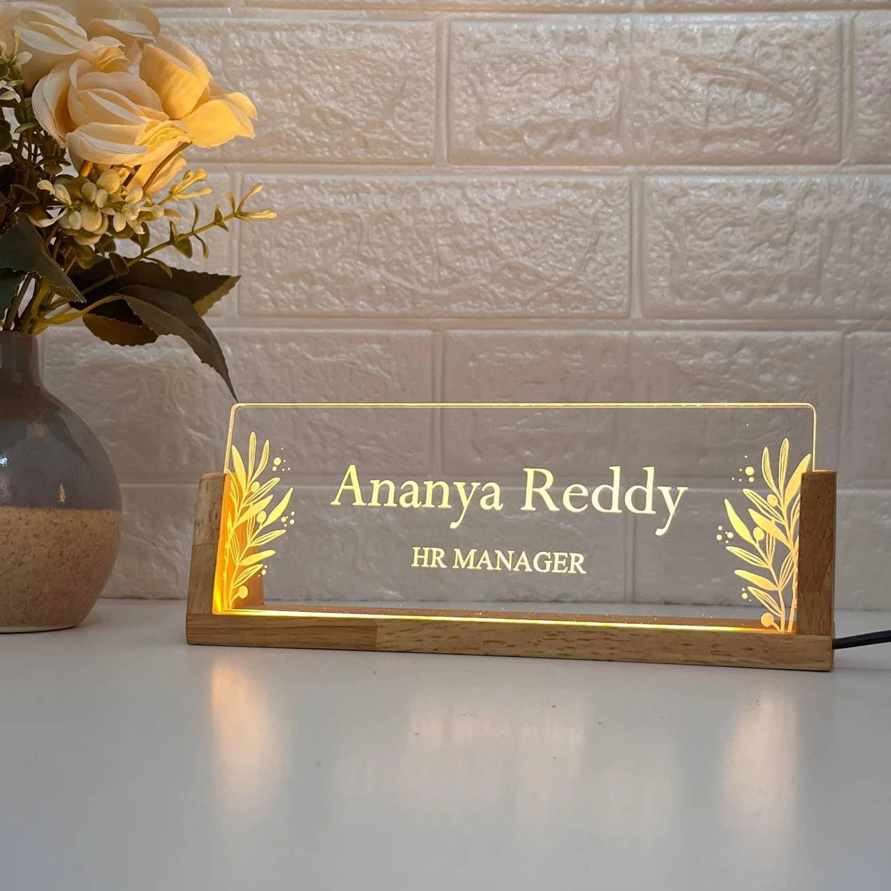 Personalised LED Desk Name Plate – Floral Leaf Design – on a desk
