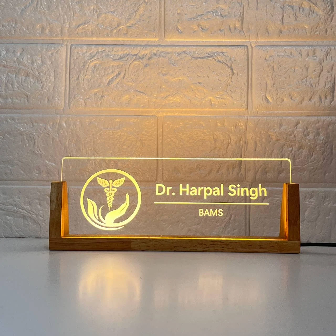Personalised LED Desk Name Plate for Ayurveda Doctors – close-up of the engraving