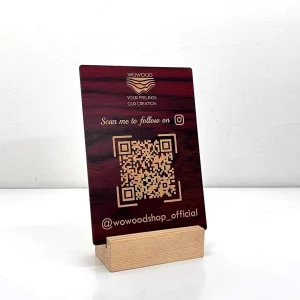 Red mahogany qr code stand – on a counter